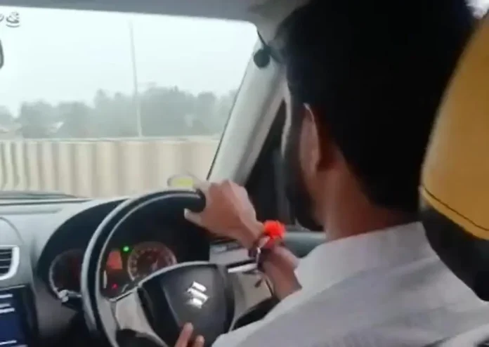 Ajith Kadaba and Samsheer Mani human gesture shifting injured persons in private car after accident at Mani flyover